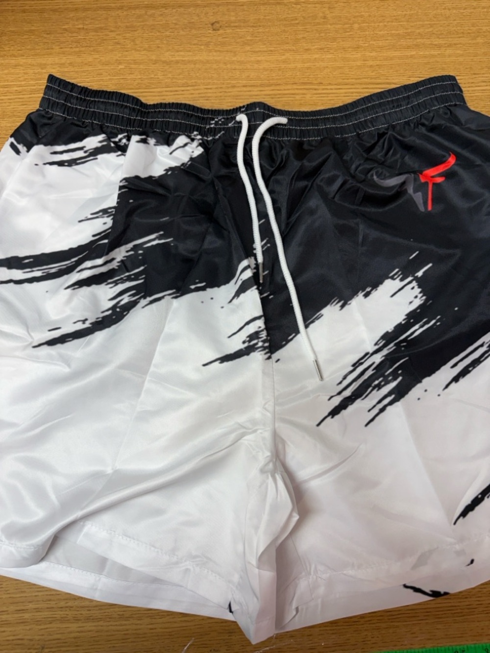 Black & White 3D Brushstroke Athletic Shorts with Red Logo